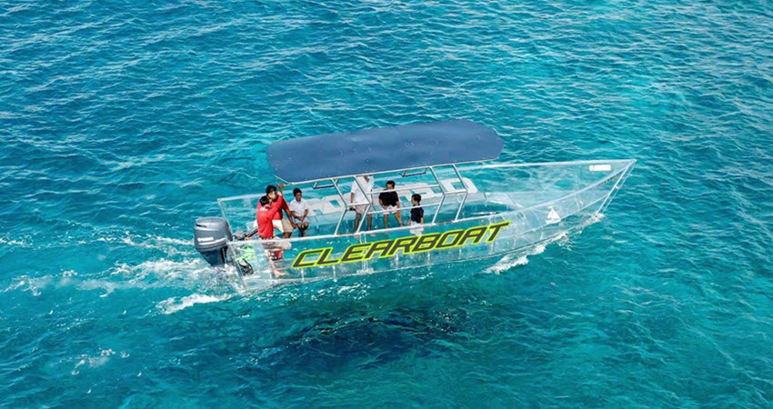 Snorkeling Expedition On A Transparent Boat